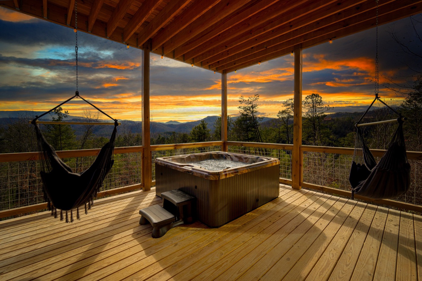 Hot tub with panoramic Smoky Mountain sunset views